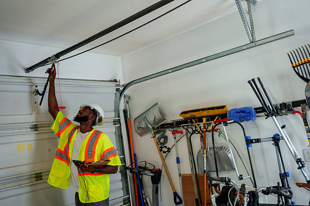 Professional Garage Door Panel Replacement technician working in Evart, MI